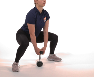 Squat sumo avec haltère